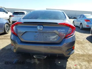 2019 Honda Civic Sport with VIN 19XFC2F82KE019704, listed as a IAAI auction lot 41770051 with 90,011 mi miles and . Bid and sale history available at DreamBid. Image 16.