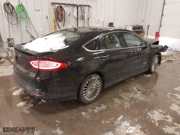 2014 Ford Fusion Titanium Hybrid with VIN 3FA6P0RUXER355654, listed as a IAAI auction lot 41611653 with 211,353 mi miles. Bid and sale history available at carsss.com. Image 4.