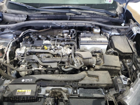 2023 Toyota Corolla Cross LE z VIN 7MUBAAAG4PV042580, wystawiony jako Copart lot #60788025 z przebiegiem 59 576 mil mil oraz Szkoda całkowita • Salvage title. Historia ofert i sprzedaży dostępna na DreamBid. Obrazek 12.