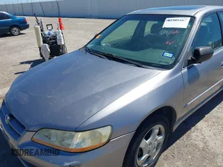 2000 Honda Accord EX z VIN JHMCG5656YC033893, wystawiony jako IAAI lot #42305487 z przebiegiem 224 625 mil mil oraz . Historia ofert i sprzedaży dostępna na DreamBid. Obrazek 6.