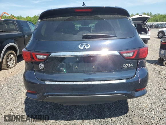 2020 Infiniti QX60 Luxe with VIN 5N1DL0MM2LC528742, listed as a Copart auction lot 56390605 with 66,786 mi miles and Salvage title. Bid and sale history available at DreamBid. Image 6.