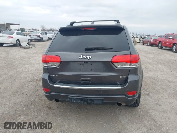2015 Jeep Grand Cherokee Overland with VIN 1C4RJFCT3FC131122, listed as a IAAI auction lot 41513892 with 125,765 mi miles. Bid and sale history available at carsss.com. Image 16.