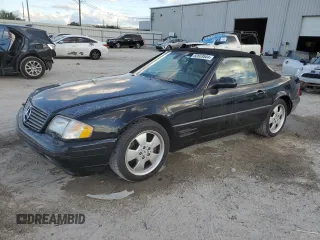 1999 Mercedes-Benz SL-Class with VIN WDBFA68F0XF186163, listed as a Copart auction lot 82669544 with 184,054 mi miles and Salvage Title. Bid and sale history available at carsss.com. Image 1.