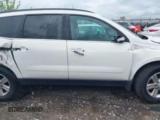 2014 Chevrolet Traverse LT with VIN 1GNKRGKD6EJ273783, listed as a IAAI auction lot 42103544 with 107,179 mi miles and . Bid and sale history available at DreamBid. Image 14.