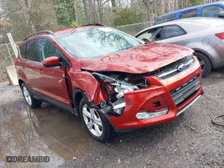 2016 Ford Escape SE with VIN 1FMCU9GXXGUB02932, listed as a IAAI auction lot 41797351 with 74,284 mi miles. Bid and sale history available at carsss.com. Image 1.