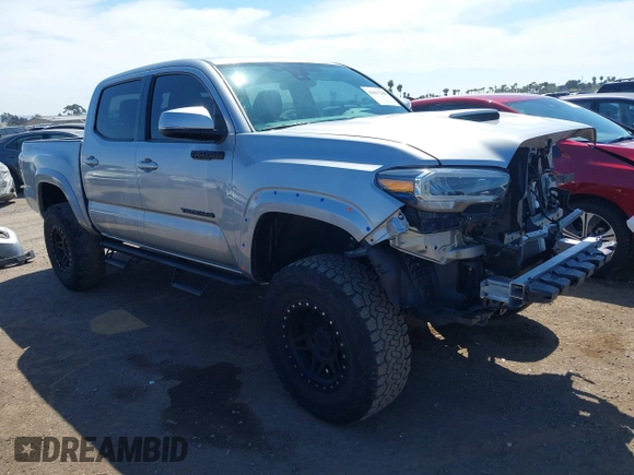 2021 Toyota Tacoma SR5 with VIN 3TMAZ5CN5MM156116, listed as a IAAI auction lot 42017208 with 34,410 mi miles and . Bid and sale history available at DreamBid. Image 1.