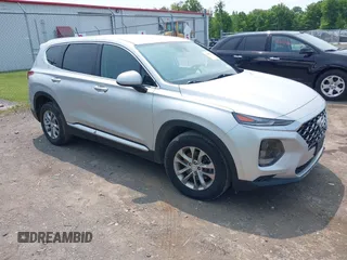 2019 Hyundai Santa Fe SE z VIN 5NMS2CAD2KH058961, wystawiony jako IAAI lot #42395683 z przebiegiem 81 228 mil mil oraz . Historia ofert i sprzedaży dostępna na DreamBid. Obrazek 1.