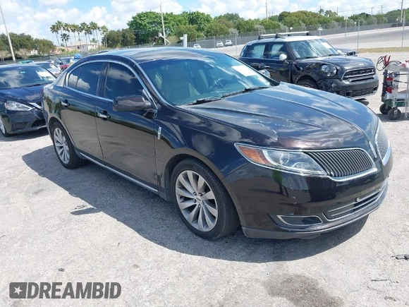 2014 Lincoln MKS with VIN 1LNHL9EK0EG608300, listed as a IAAI auction lot 41900902 with 144,253 mi miles. Bid and sale history available at carsss.com. Image 1.