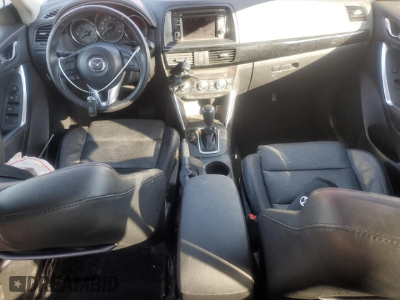 2014 Mazda CX-5 Grand Touring with VIN JM3KE4DY9E0419111, listed as a Copart auction lot 52250315 with 130,003 mi miles and Salvage Title. Bid and sale history available at DreamBid. Image 8.