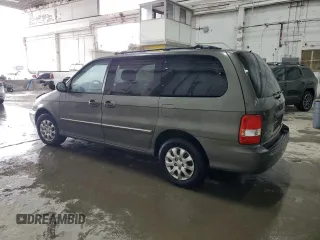 2005 Kia Sedona LX with VIN KNDUP132656723226, listed as a Copart auction lot 52886115 with 0 mi miles and Salvage Title. Bid and sale history available at carsss.com. Image 2.