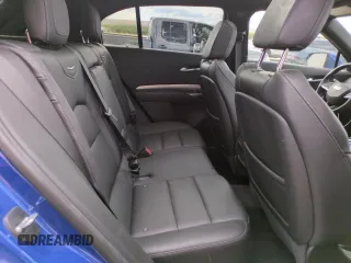 2023 Cadillac XT4 FWD Premium Luxury z VIN 1GYFZCR49PF104995, wystawiony jako Copart lot #53312695 z przebiegiem 28 647 mil mil oraz Szkody całkowita. Historia ofert i sprzedaży dostępna na DreamBid. Obrazek 11.