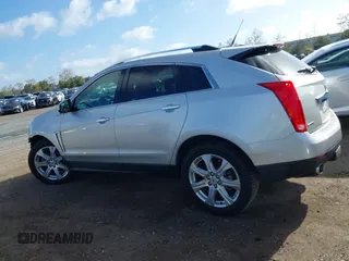 2014 Cadillac SRX Performance Collection with VIN 3GYFNCE39ES544135, listed as a IAAI auction lot 41808644 with 145,772 mi miles and . Bid and sale history available at carsss.com. Image 15.