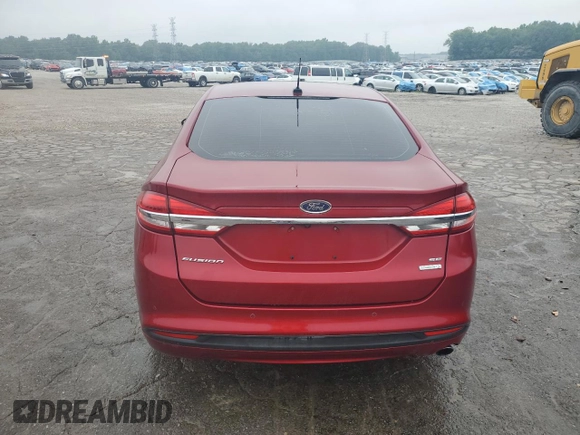 2017 Ford Fusion SE z VIN 3FA6P0HD1HR262320, wystawiony jako Copart lot #55850095 z przebiegiem 129 244 mil mil oraz Czysty tytuł • Clean title. Historia ofert i sprzedaży dostępna na DreamBid. Obrazek 6.