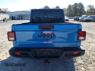 2020 Jeep Gladiator Sport S с VIN 1C6HJTAG4LL175780, выставлен на аукционе Copart как лот 50203395 с пробегом 74 477 миль миль и Списание • Salvage title. История ставок и продаж доступна на DreamBid. Изображение 6.