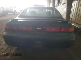 1995 Nissan 240SX z VIN JN1AS44D6SW020744, wystawiony jako Copart lot #64406924 z przebiegiem 87 165 mil mil oraz Szkody całkowita. Historia ofert i sprzedaży dostępna na DreamBid. Obrazek 6.