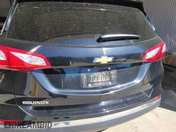 2020 Chevrolet Equinox LT z VIN 2GNAXJEV5L6233921, wystawiony jako IAAI lot #42466454 z przebiegiem 64 667 mil mil oraz . Historia ofert i sprzedaży dostępna na DreamBid. Obrazek 6.