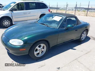 1999 Mazda MX-5 Miata with VIN JM1NB3530X0103644, listed as a IAAI auction lot 42524948 with Not provided miles and . Bid and sale history available at DreamBid. Image 2.