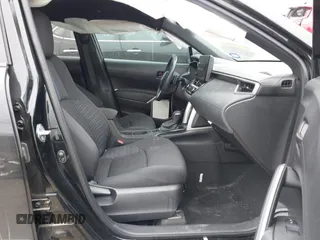 2023 Toyota Corolla Cross Hybrid S with VIN 7MUFBABG6PV010999, listed as a IAAI auction lot 41489541 with 14,707 mi miles and . Bid and sale history available at DreamBid. Image 5.