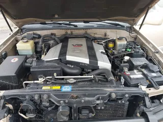 1999 Lexus LX 470 z VIN JT6HT00W8X0045705, wystawiony jako IAAI lot #42005587 z przebiegiem 443 758 mil mil oraz . Historia ofert i sprzedaży dostępna na DreamBid. Obrazek 10.