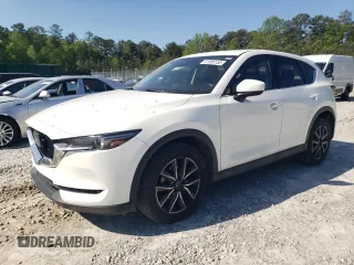 2018 Mazda CX-5 Grand Touring z VIN JM3KFADM0J0301760, wystawiony jako Copart lot #51986155 z przebiegiem 118 556 mil mil oraz Szkoda całkowita • Salvage title. Historia ofert i sprzedaży dostępna na DreamBid. Obrazek 1.