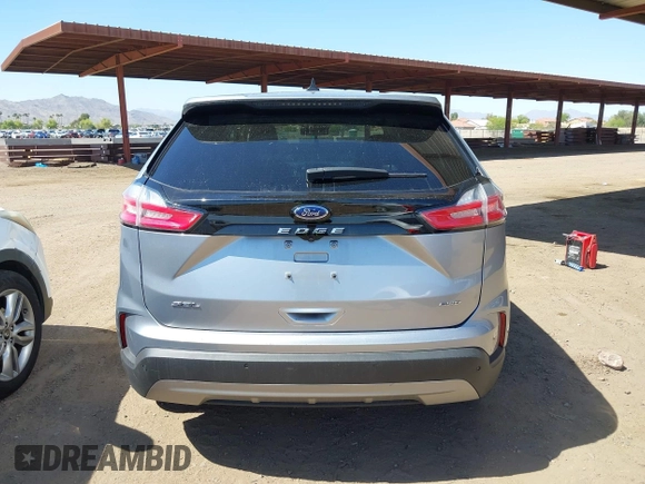 2021 Ford Edge SEL z VIN 2FMPK4J98MBA50772, wystawiony jako IAAI lot #42224052 z przebiegiem 76 061 mil mil oraz . Historia ofert i sprzedaży dostępna na DreamBid. Obrazek 16.
