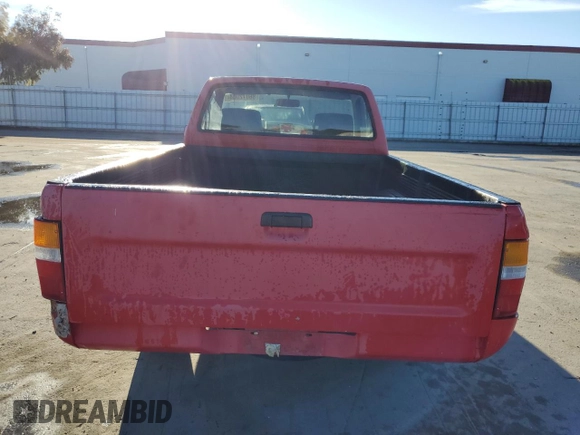 1991 Toyota Pickup z VIN JT4RN81AXM0072912, wystawiony jako Copart lot #86072004 z przebiegiem 210 493 mil mil oraz Szkoda całkowita • Salvage title. Historia ofert i sprzedaży dostępna na DreamBid. Obrazek 6.