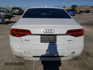 2015 Audi A8 с VIN WAUJGAFD3FN030568, выставлен на аукционе Copart как лот 75785923 с пробегом 83 911 миль миль и . История ставок и продаж доступна на DreamBid. Изображение 6.