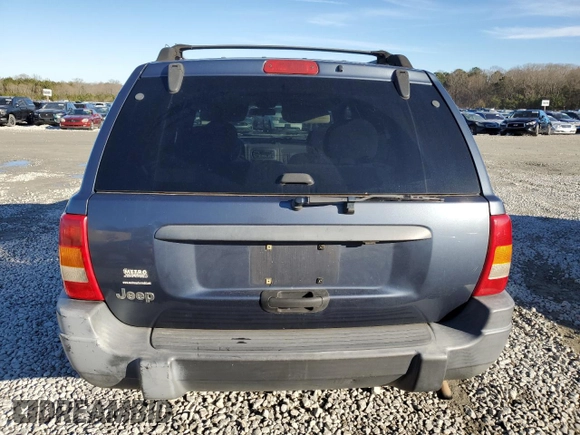 2001 Jeep Grand Cherokee Laredo z VIN 1J4GW48S91C578800, wystawiony jako Copart lot #87934695 z przebiegiem 250 784 mil mil oraz Szkoda całkowita • Salvage title. Historia ofert i sprzedaży dostępna na DreamBid. Obrazek 6.
