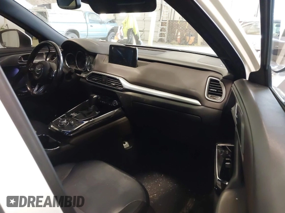 2017 Mazda CX-9 Grand Touring with VIN JM3TCADY5H0132572, listed as a IAAI auction lot 41421008 with 66,656 mi miles and . Bid and sale history available at DreamBid. Image 5.