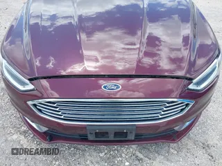 2018 Ford Fusion Titanium with VIN 3FA6P0K92JR114283, listed as a IAAI auction lot 42704476 with 92,502 mi miles and . Bid and sale history available at DreamBid. Image 6.