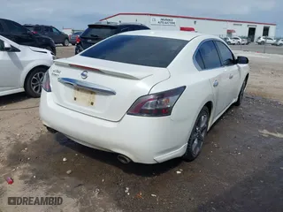 2014 Nissan Maxima 3.5 SV w/Sport Pkg with VIN 1N4AA5AP7EC447012, listed as a IAAI auction lot 41854199 with 219,367 mi miles. Bid and sale history available at carsss.com. Image 4.