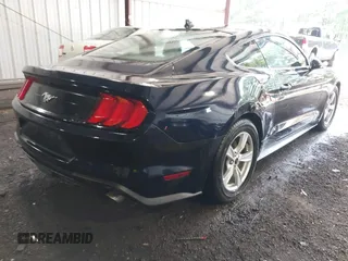 2021 Ford Mustang EcoBoost z VIN 1FA6P8TH4M5126706, wystawiony jako IAAI lot #42465164 z przebiegiem 49 795 mil mil oraz . Historia ofert i sprzedaży dostępna na DreamBid. Obrazek 4.