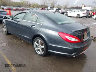 2014 Mercedes-Benz CLS 550 with VIN WDDLJ9BBXEA089595, listed as a IAAI auction lot 41892913 with 136,740 mi miles and . Bid and sale history available at DreamBid. Image 3.