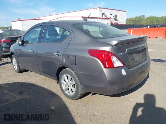 2014 Nissan Versa SV with VIN 3N1CN7AP2EL877539, listed as a IAAI auction lot 42107642 with 122,616 mi miles. Bid and sale history available at carsss.com. Image 3.