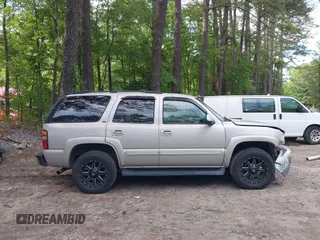 2005 Chevrolet Tahoe LS z VIN 1GNEK13T45J167997, wystawiony jako IAAI lot #42298160 z przebiegiem 142 981 mil mil oraz . Historia ofert i sprzedaży dostępna na DreamBid. Obrazek 13.