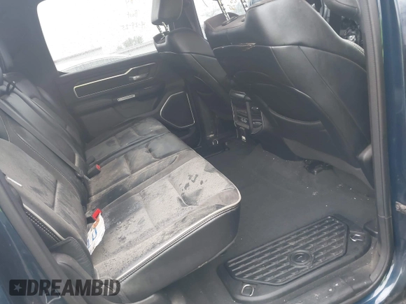 2023 Ram 1500 Laramie with VIN 1C6SRFJT9PN542437, listed as a IAAI auction lot 42256410 with 5 mi miles and . Bid and sale history available at DreamBid. Image 8.