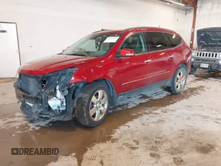 2014 Chevrolet Traverse LTZ z VIN 1GNKRJKD8EJ210990, wystawiony jako IAAI lot #41655601 z przebiegiem 218 804 mil mil oraz . Historia ofert i sprzedaży dostępna na DreamBid. Obrazek 2.