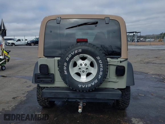 1999 Jeep Wrangler Sahara with VIN 1J4FY49S0XP480017, listed as a IAAI auction lot 41642577 with 154,068 mi miles. Bid and sale history available at carsss.com. Image 16.