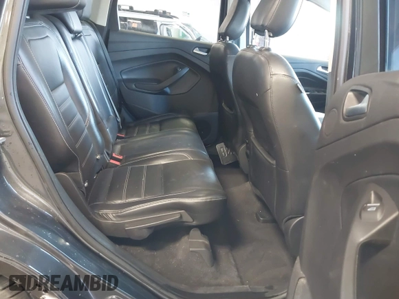 2019 Ford Escape Titanium with VIN 1FMCU9J97KUC55772, listed as a IAAI auction lot 42514001 with 77,737 mi miles and . Bid and sale history available at DreamBid. Image 8.