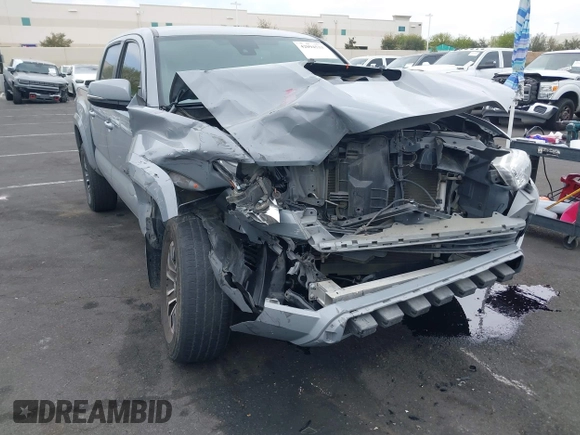 2021 Toyota Tacoma SR with VIN 3TMCZ5AN2MM405869, listed as a IAAI auction lot 42094533 with 78,449 mi miles and . Bid and sale history available at DreamBid. Image 1.