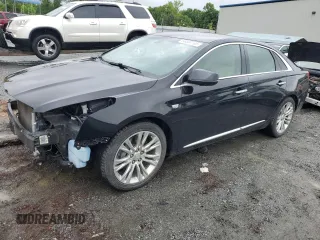 2019 Cadillac XTS Luxury with VIN 2G61M5S37K9133248, listed as a Copart auction lot 56604765 with 140,682 mi miles and Salvage title. Bid and sale history available at DreamBid. Image 1.
