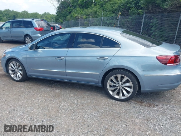 2013 Volkswagen CC Executive z VIN WVWGU7AN3DE524175, wystawiony jako IAAI lot #42401952 z przebiegiem 165 023 mil mil oraz . Historia ofert i sprzedaży dostępna na DreamBid. Obrazek 3.