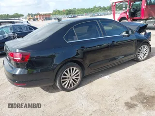 2016 Volkswagen Jetta SEL z VIN 3VWL07AJ2GM259395, wystawiony jako IAAI lot #42448235 z przebiegiem 101 032 mil mil oraz . Historia ofert i sprzedaży dostępna na DreamBid. Obrazek 4.