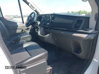 2023 Ford Transit Cargo with VIN 1FTBR1X80PKB45974, listed as a IAAI auction lot 42609404 with 35,940 mi miles and . Bid and sale history available at DreamBid. Image 5.
