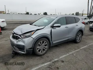 2020 Honda CR-V Touring z VIN 7FARW1H96LE006653, wystawiony jako Copart lot #57167475 z przebiegiem 49 286 mil mil oraz Szkoda całkowita • Salvage title. Historia ofert i sprzedaży dostępna na DreamBid. Obrazek 1.