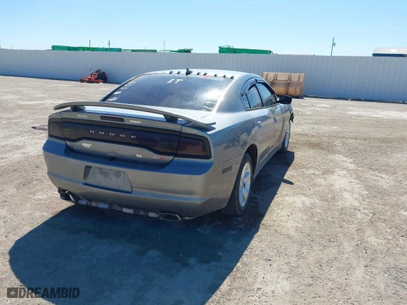 2014 Dodge Charger SE with VIN 2C3CDXBG1EH168709, listed as a IAAI auction lot 41872541 with 137,877 mi miles. Bid and sale history available at carsss.com. Image 4.