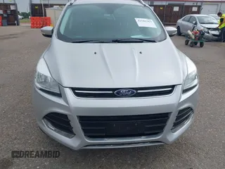 2016 Ford Escape Titanium with VIN 1FMCU9JX3GUC86930, listed as a IAAI auction lot 42582263 with 113,386 mi miles and . Bid and sale history available at DreamBid. Image 12.