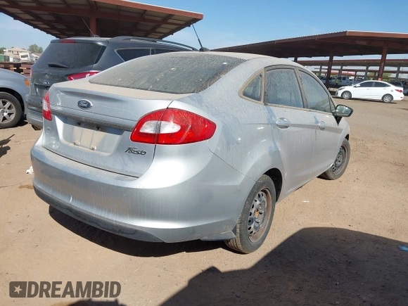 2013 Ford Fiesta SE z VIN 3FADP4BJ7DM165174, wystawiony jako IAAI lot #42311167 z przebiegiem 90 592 mil mil oraz . Historia ofert i sprzedaży dostępna na DreamBid. Obrazek 4.