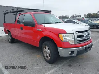 2014 Ford F-150 XL with VIN 1FTEX1CM0EKF80495, listed as a IAAI auction lot 42014592 with 141,213 mi miles. Bid and sale history available at carsss.com. Image 1.