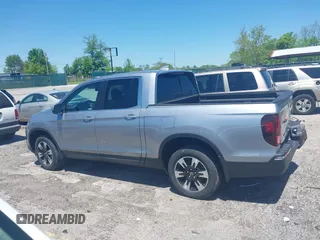 2020 Honda Ridgeline RTL with VIN 5FPYK3F5XLB019296, listed as a IAAI auction lot 42204290 with 48,197 mi miles and . Bid and sale history available at DreamBid. Image 14.